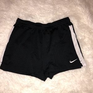 Black Nike Dry-Fit athletic shorts
